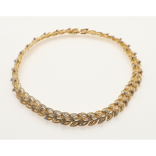 291 - AN 18CT GOLD AND DIAMOND NECKLACE BY RAYMOND YARD. of overlapping leaf design, mounted with circular... 