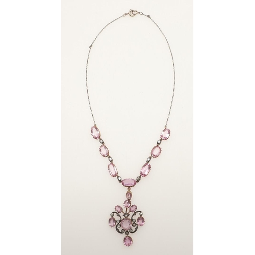 292 - A VICTORIAN PINK TOPAZ AND DIAMOND NECKLACE AND PENDANT. the scrolling openwork pendant centred with... 