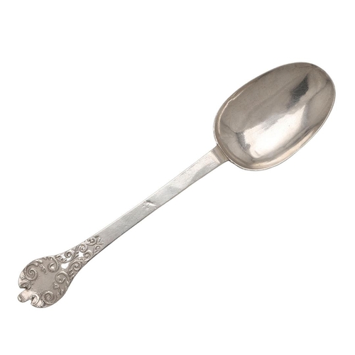 36 - A CHARLES II SILVER LACE-BACK TREFID SPOON. the back of the bowl with a ribbed rattail and arabesque... 