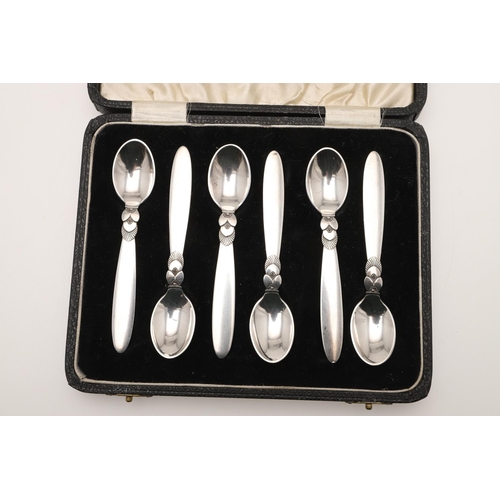 40 - A 20TH CENTURY CASED SET OF SIX SILVER TEA/ COFFEE SPOONS, BY GEORG JENSEN LTD. Cactus pattern (+ 2 ... 