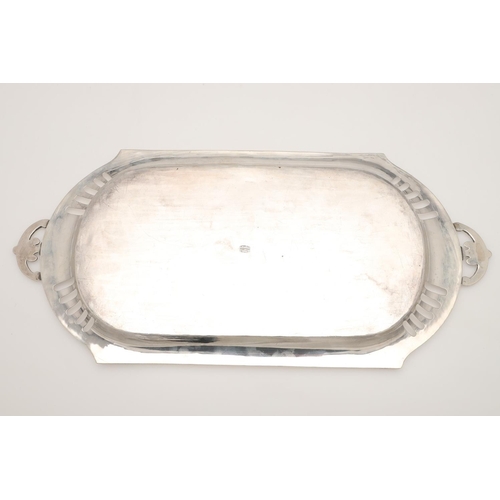 48 - AN INDIAN SILVER TWO-HANDLED TRAY. of shaped rectangular outline, with twin ribbon tied handles, ini... 