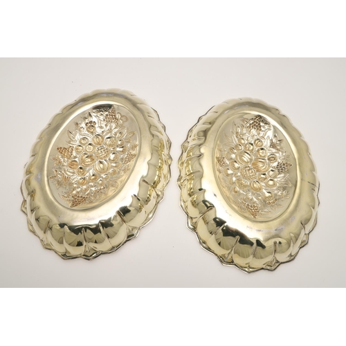 51 - A VICTORIAN SILVERGILT FRUIT TAZZA & MATCHING DISHES. of shaped oval outline, with bead borders and ... 