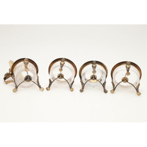 68 - A 19TH CENTURY FRENCH SILVERGILT FOUR-PIECE CONDIMENT SET. a mustard pot & three salts of circular f... 