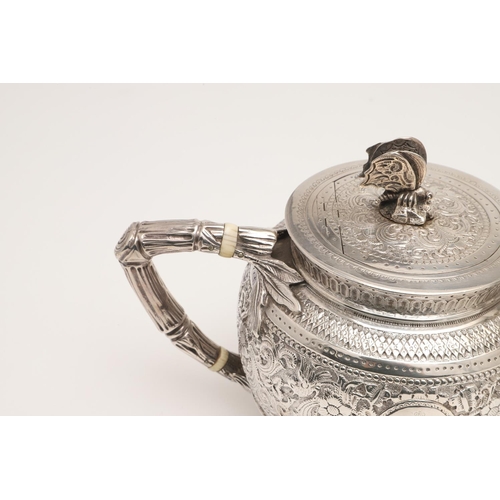 72 - A LATE VICTORIAN FOUR-PIECE SILVER TEA & COFFEE SERVICE. of circular form, with naturalistic handles... 