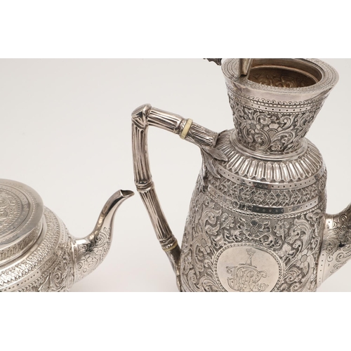 72 - A LATE VICTORIAN FOUR-PIECE SILVER TEA & COFFEE SERVICE. of circular form, with naturalistic handles... 