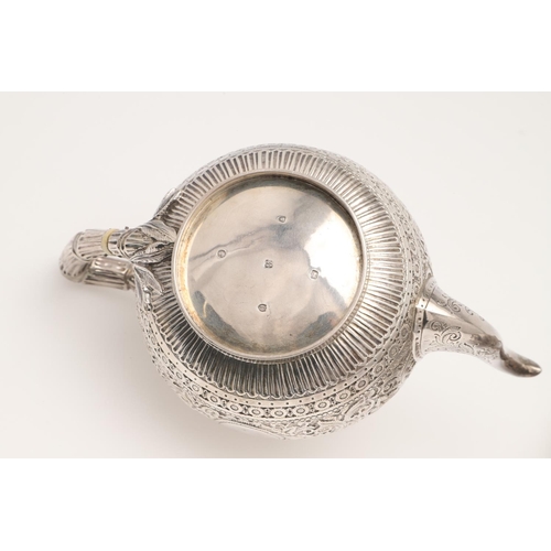 72 - A LATE VICTORIAN FOUR-PIECE SILVER TEA & COFFEE SERVICE. of circular form, with naturalistic handles... 