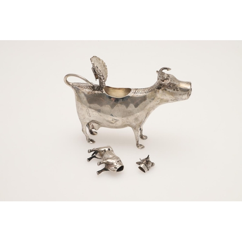 74 - A 19TH CENTURY FRENCH SILVER COW CREAMER. the floral hinged cover with an applied fly, makers mark i... 