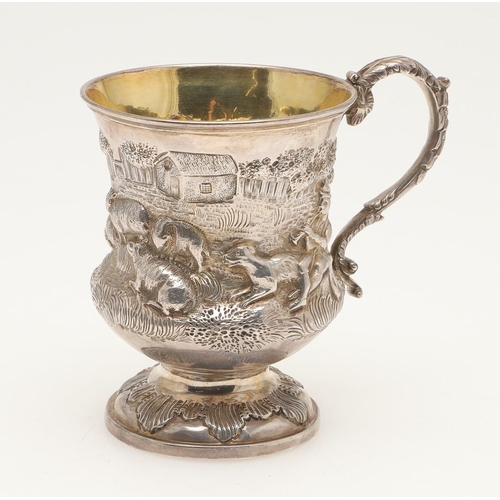 79 - A WILLIAM IV SILVER CHISTENING MUG. of campana form, with a leaf-capped 'S'-scroll handle and decora... 