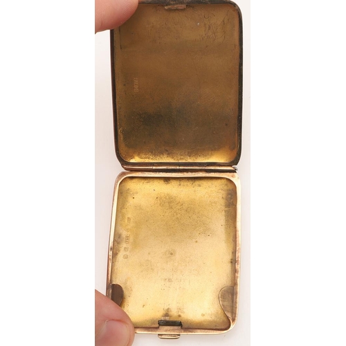 87 - AN EARLY 20TH CENTURY 9CT. GOLD BOOK MATCH HOLDER. of rounded rectangular form, the cover inscribed ... 