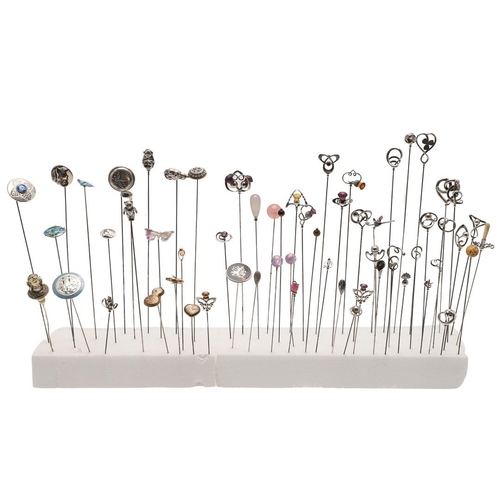 89 - A COLLECTION OF SIXTY-TWO VARIOUS HAT PINS. including examples decorated with enamel, animals & inse... 