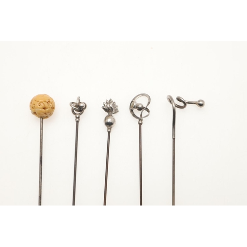 89 - A COLLECTION OF SIXTY-TWO VARIOUS HAT PINS. including examples decorated with enamel, animals & inse... 