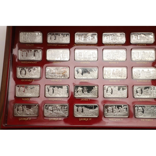 97 - AN ELIZABETH II CASED SET OF FIFTY COMMEMORATIVE SILVER INGOTS. of rectangular form, each depicting ... 