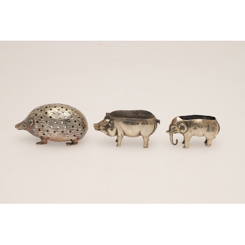 88 - A MIXED LOT OF SILVER. to include a baby rattle with a coral teether, three pin cushions (hedgehog, ... 