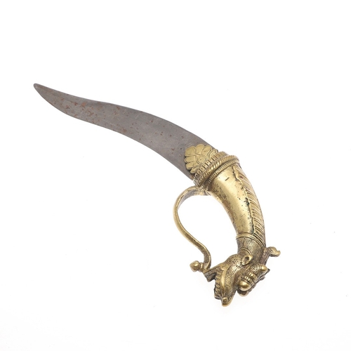 105 - AN INDIAN BICH-HWA TYPE KNIFE WITH ELABORATE LION POMMEL. The 18.5 cm curved blade with a pointed ti... 