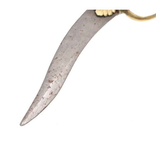 105 - AN INDIAN BICH-HWA TYPE KNIFE WITH ELABORATE LION POMMEL. The 18.5 cm curved blade with a pointed ti... 