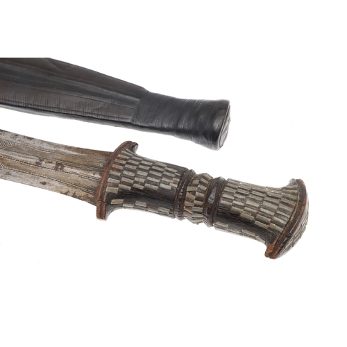108 - A NEAR IDENTICAL PAIR OF SUDANESE KNIVES AND SCABBARDS. The two blades 32 cm and 30 cm, with curved ... 