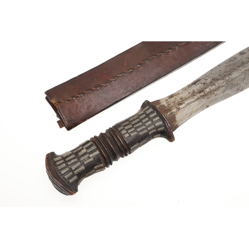 108 - A NEAR IDENTICAL PAIR OF SUDANESE KNIVES AND SCABBARDS. The two blades 32 cm and 30 cm, with curved ... 