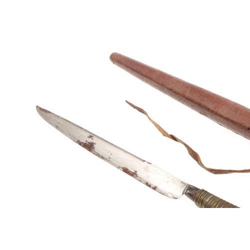 116 - A SOUTH ALGERIAN BOU SADDI KNIFE AND SCABBARD. The 13.5 cm slender pointed blade with engraved decor... 