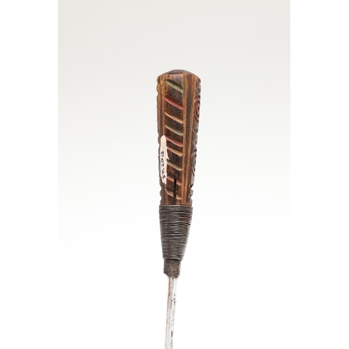 117 - A SOUTH ALGERIAN BOU SADDI KNIFE AND SCABBARD. The 13.5 cm pointed blade with red dot decoration, on... 