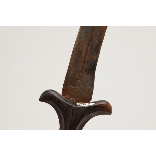 118 - A BEDJA ERITREAN KNIFE WITH X FORM HANDLE. The 20 cm hooked blade with a pointed tip sharpened to bo... 