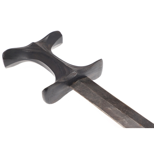 119 - A BEDJA ERITREAN KNIFE WITH 'X' FORM HANDLE. The knife having a 21 cm hooked blade sharpened to both... 