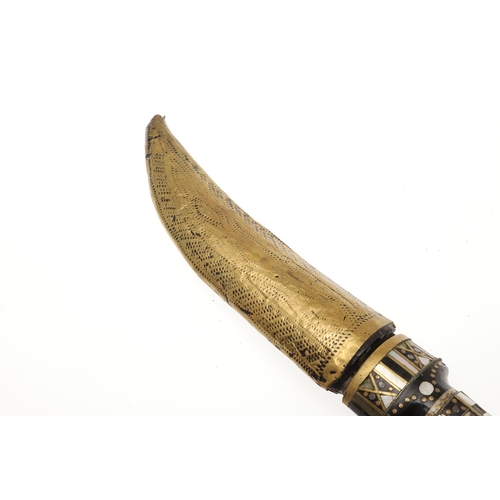 120 - A SYRIAN OR JORDANIAN DAGGER WITH DECORATIVE HILT. The 13.5 cm curved blade sharpened to both edges,... 