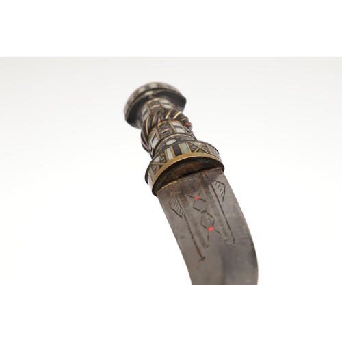 120 - A SYRIAN OR JORDANIAN DAGGER WITH DECORATIVE HILT. The 13.5 cm curved blade sharpened to both edges,... 
