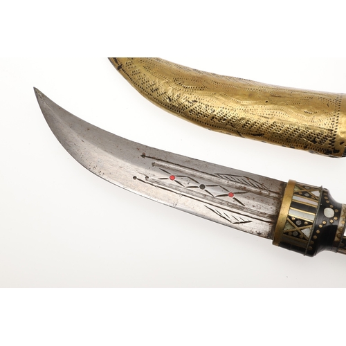 120 - A SYRIAN OR JORDANIAN DAGGER WITH DECORATIVE HILT. The 13.5 cm curved blade sharpened to both edges,... 