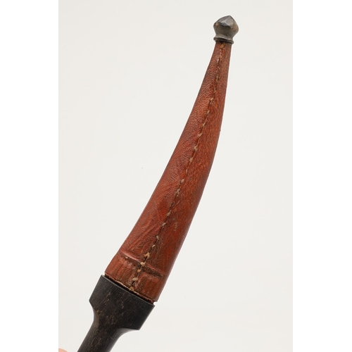 139 - A DAGGER AND SCABBARD, POSSIBLY MARSH ARAB. The short 14 cm curved, pointed and double edged blade w... 