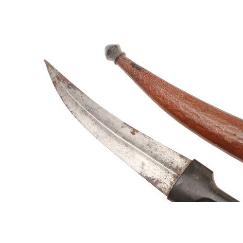139 - A DAGGER AND SCABBARD, POSSIBLY MARSH ARAB. The short 14 cm curved, pointed and double edged blade w... 