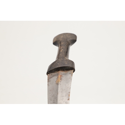 139 - A DAGGER AND SCABBARD, POSSIBLY MARSH ARAB. The short 14 cm curved, pointed and double edged blade w... 