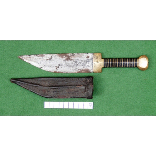 158 - A NORTH AFRICAN KNIFE AND SCABBARD. The 15.5 cm straight blade with pointed tip and sharpened edge. ... 
