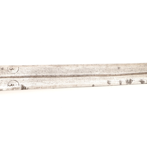 160 - A TAKOUBA SWORD AND SCABBARD OF THE TUAREG PEOPLE. The 79 cm straight tapering blade with rounded po... 