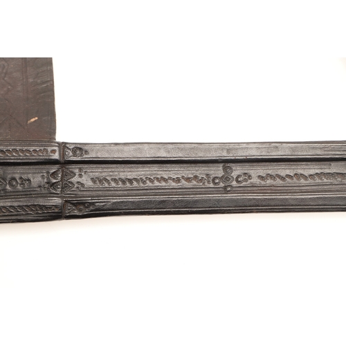 160 - A TAKOUBA SWORD AND SCABBARD OF THE TUAREG PEOPLE. The 79 cm straight tapering blade with rounded po... 