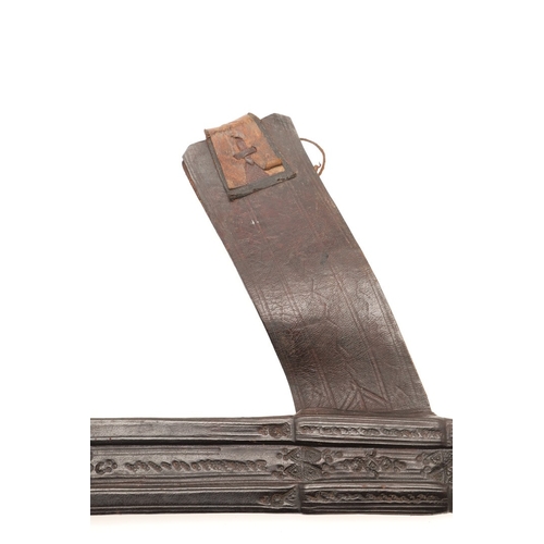 160 - A TAKOUBA SWORD AND SCABBARD OF THE TUAREG PEOPLE. The 79 cm straight tapering blade with rounded po... 