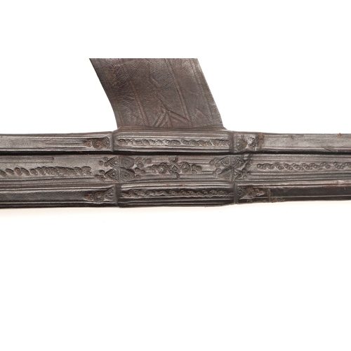 160 - A TAKOUBA SWORD AND SCABBARD OF THE TUAREG PEOPLE. The 79 cm straight tapering blade with rounded po... 