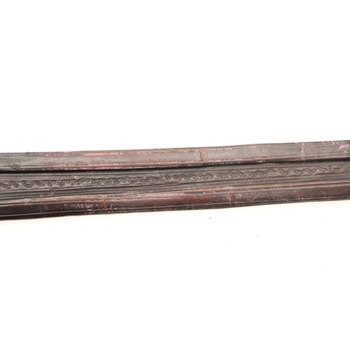 160 - A TAKOUBA SWORD AND SCABBARD OF THE TUAREG PEOPLE. The 79 cm straight tapering blade with rounded po... 