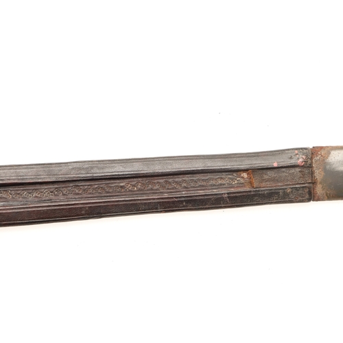 160 - A TAKOUBA SWORD AND SCABBARD OF THE TUAREG PEOPLE. The 79 cm straight tapering blade with rounded po... 