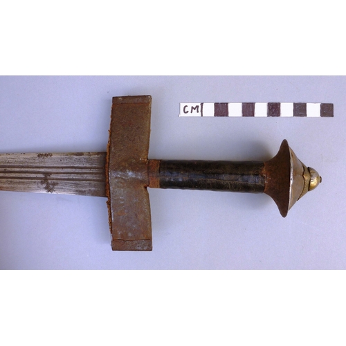 160 - A TAKOUBA SWORD AND SCABBARD OF THE TUAREG PEOPLE. The 79 cm straight tapering blade with rounded po... 