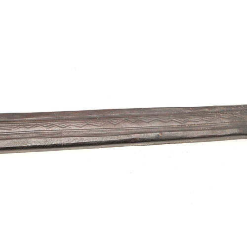 160 - A TAKOUBA SWORD AND SCABBARD OF THE TUAREG PEOPLE. The 79 cm straight tapering blade with rounded po... 