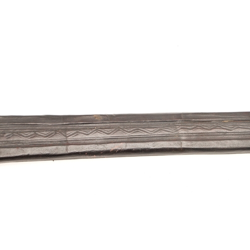 160 - A TAKOUBA SWORD AND SCABBARD OF THE TUAREG PEOPLE. The 79 cm straight tapering blade with rounded po... 