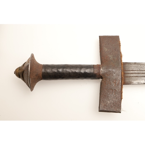 160 - A TAKOUBA SWORD AND SCABBARD OF THE TUAREG PEOPLE. The 79 cm straight tapering blade with rounded po... 