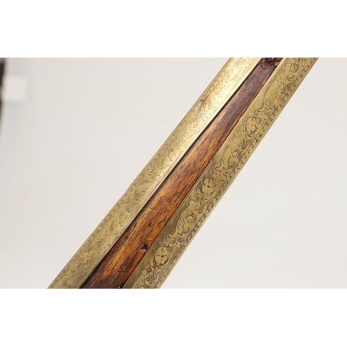 38 - A 19TH CENTURY 'JEWEL' MOUNTED JAVANESE KRIS AND SCABBARD. The 35.5 cm blade with eight curves and p... 