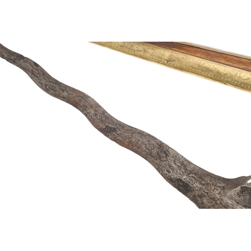 38 - A 19TH CENTURY 'JEWEL' MOUNTED JAVANESE KRIS AND SCABBARD. The 35.5 cm blade with eight curves and p... 