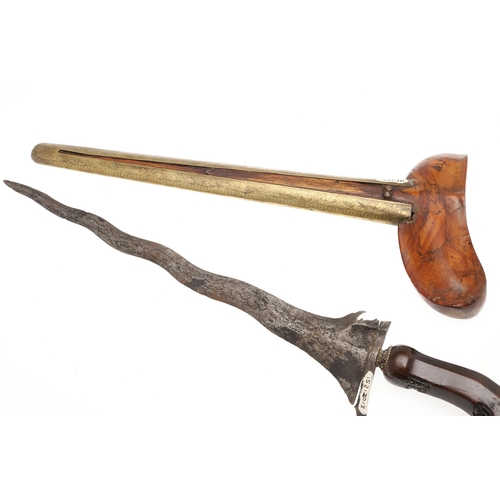 38 - A 19TH CENTURY 'JEWEL' MOUNTED JAVANESE KRIS AND SCABBARD. The 35.5 cm blade with eight curves and p... 