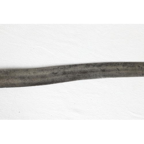 40 - A PHILIPPINES KRIS SUNDANG AND SCABBARD. The 53 cm blade with six or seven faint curves and a centra... 