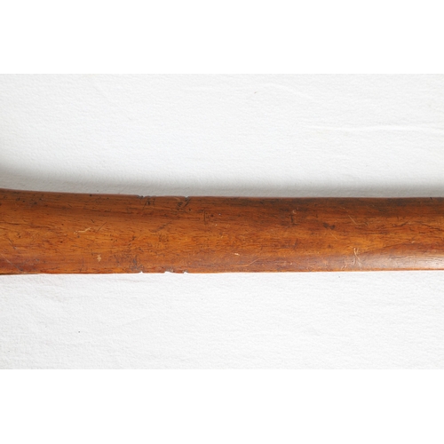 40 - A PHILIPPINES KRIS SUNDANG AND SCABBARD. The 53 cm blade with six or seven faint curves and a centra... 