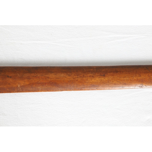 40 - A PHILIPPINES KRIS SUNDANG AND SCABBARD. The 53 cm blade with six or seven faint curves and a centra... 