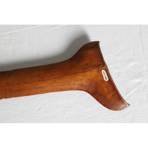 40 - A PHILIPPINES KRIS SUNDANG AND SCABBARD. The 53 cm blade with six or seven faint curves and a centra... 