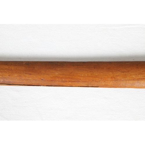 40 - A PHILIPPINES KRIS SUNDANG AND SCABBARD. The 53 cm blade with six or seven faint curves and a centra... 